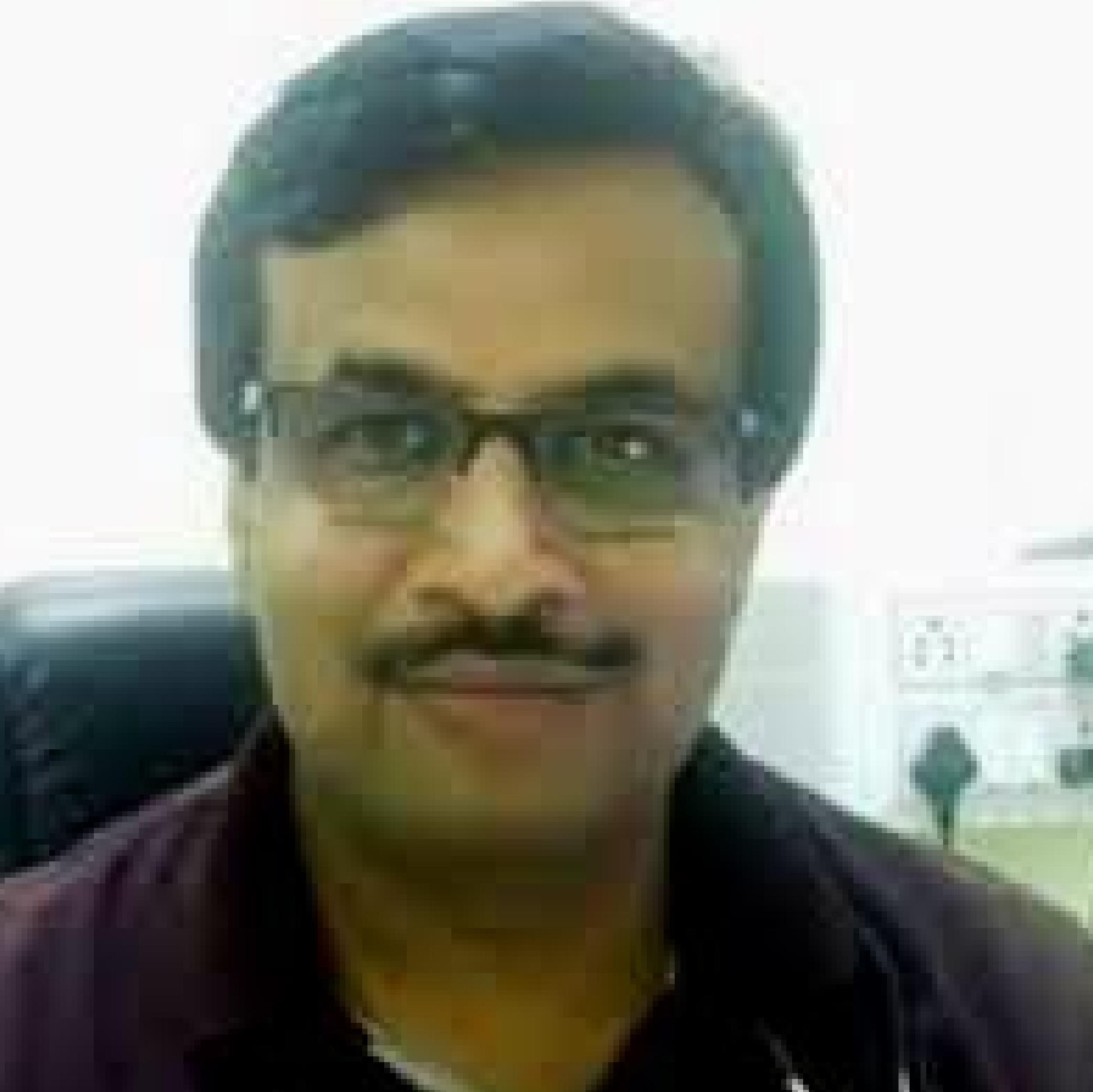 Dr. Manish Jangam